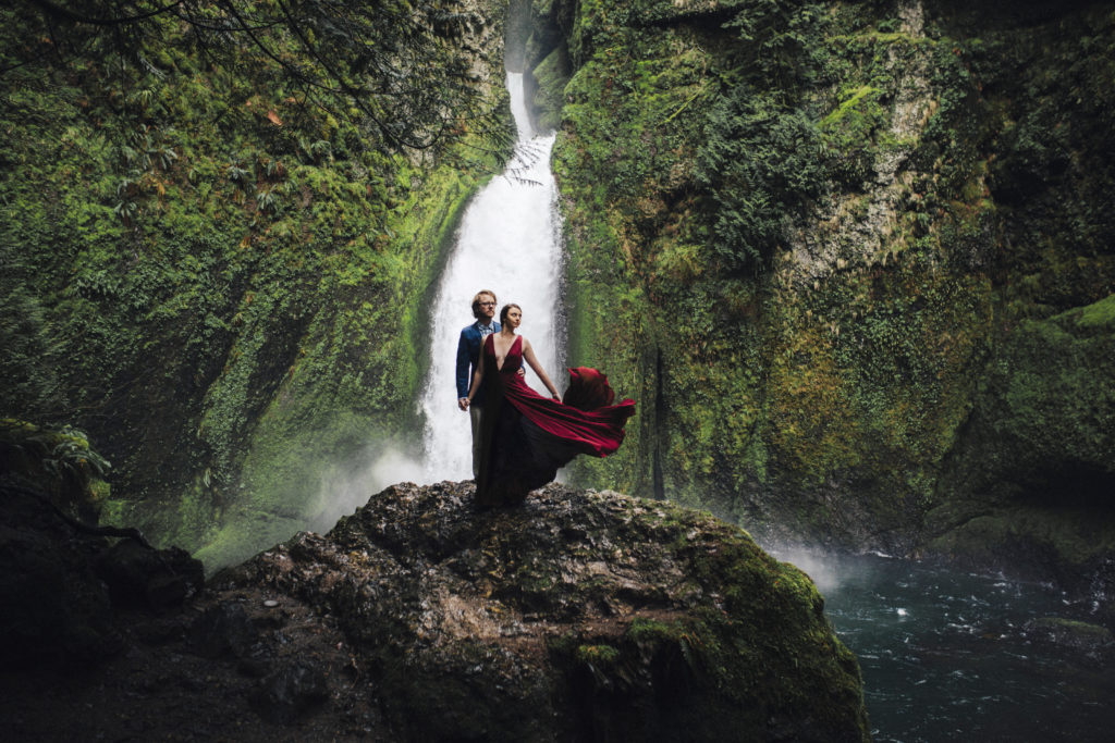 Engagement photo in front of Wahclella Falls in Cascade Locks, OR