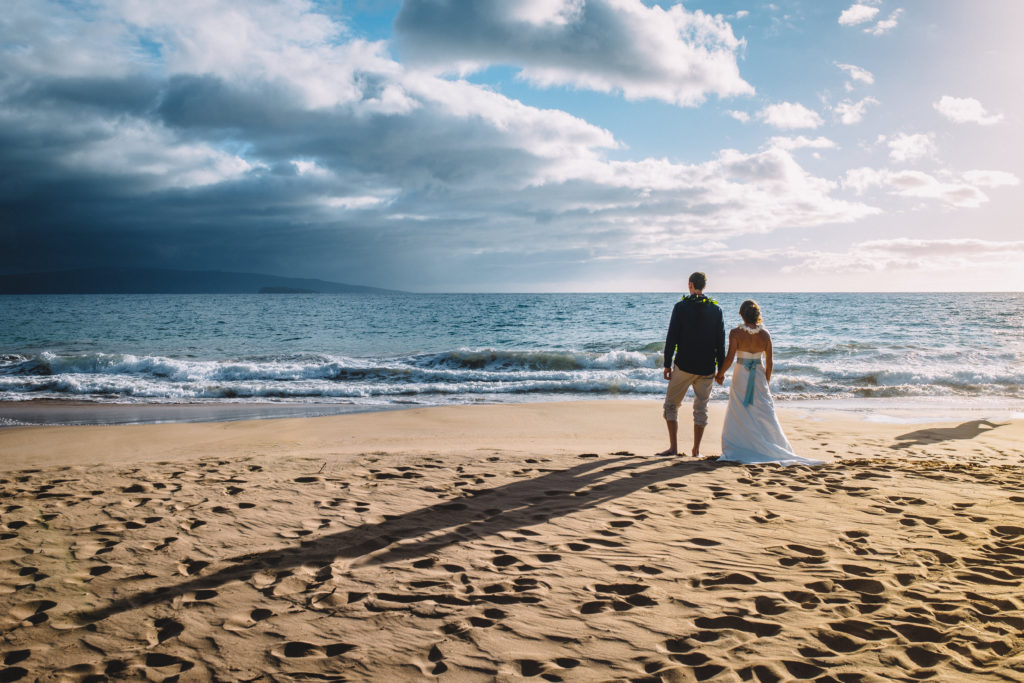 Bride and groom on the beach at their Maui, Hawaii wedding