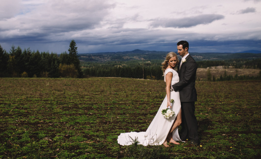 Wedding photo with the cascade mountains at Home Place Farms in Molalla, Oregon