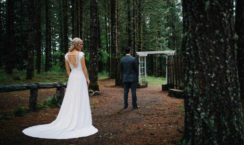A bride and groom's first look at Home Place Farm in Molalla, Oregon