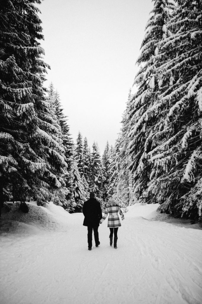 Snowy winter engagement photo in Mount Hood National Forest