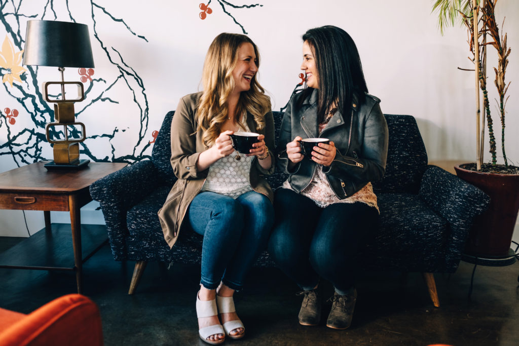 Same sex engagement session in a coffee shop in Seattle, WA