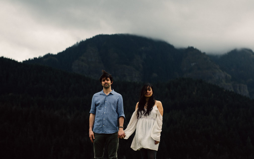 Moody artistic engagement photo in the Columbia River Gorge