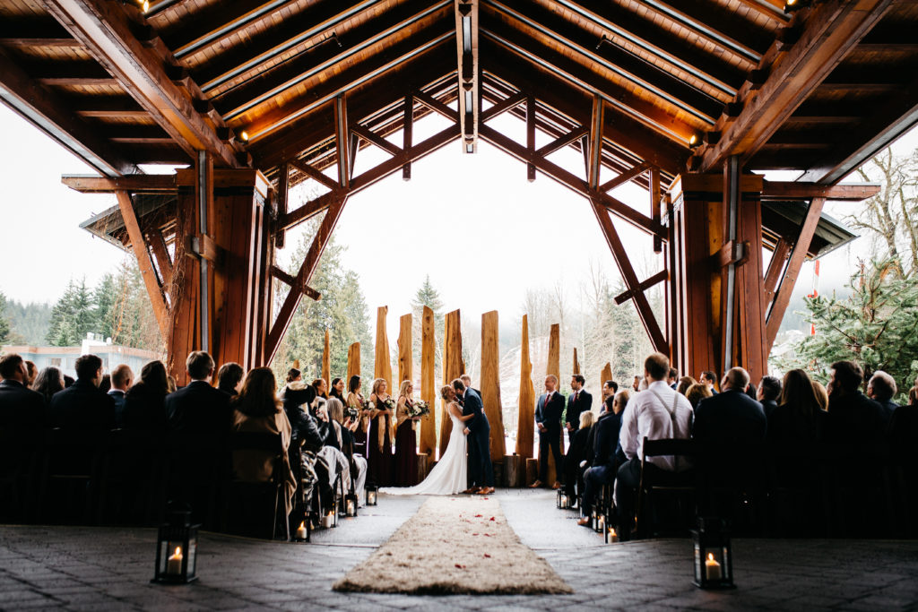 The first kiss during a wedding ceremony at Nita Lake Lodge