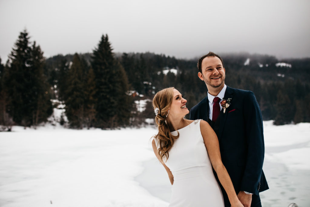A photo of the bride and groom at a winter wedding in Whistler, Canada at Nita Lake Lodge