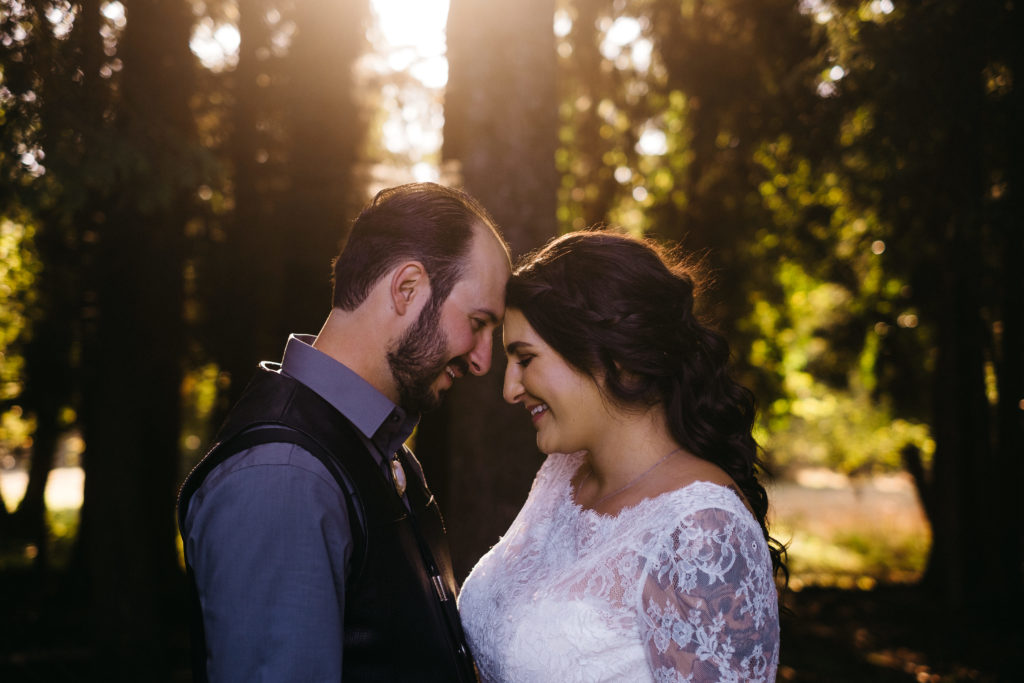 Candid wedding photo in the woods in Florence, Oregon