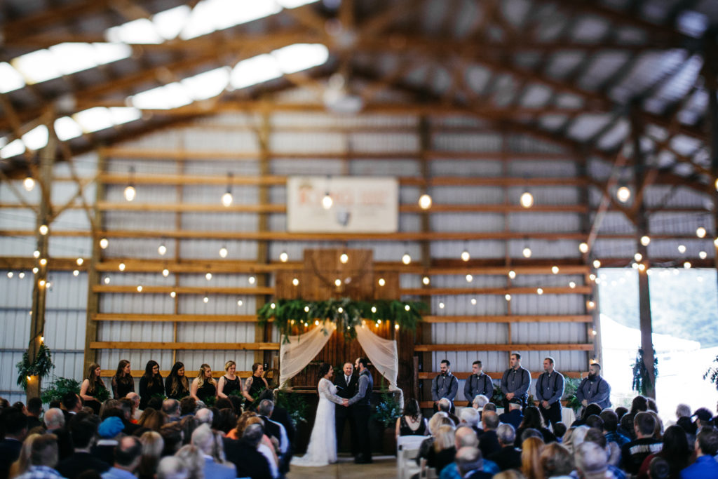 A photo of a rustic wedding ceremony in Florence, Oregon