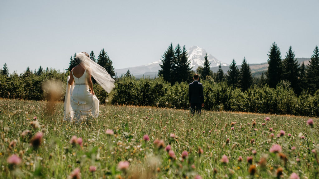 A bride and groom's first look at their Mt View Orchards wedding