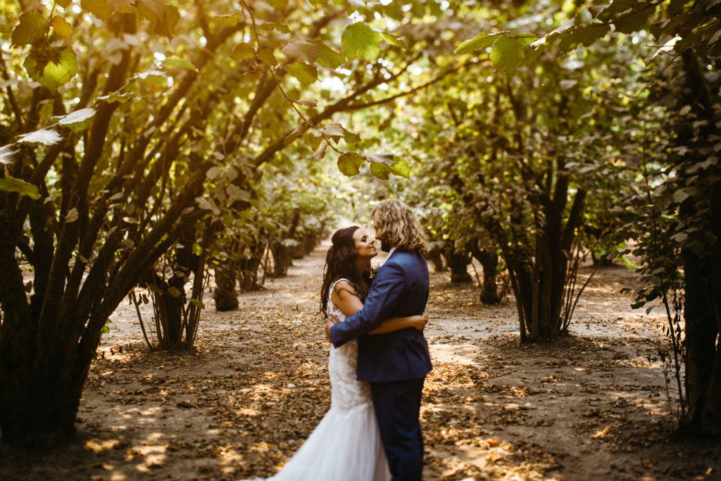 Wedding photo in the walnut fields at The Old Schoolhouse in Newberg, OR
