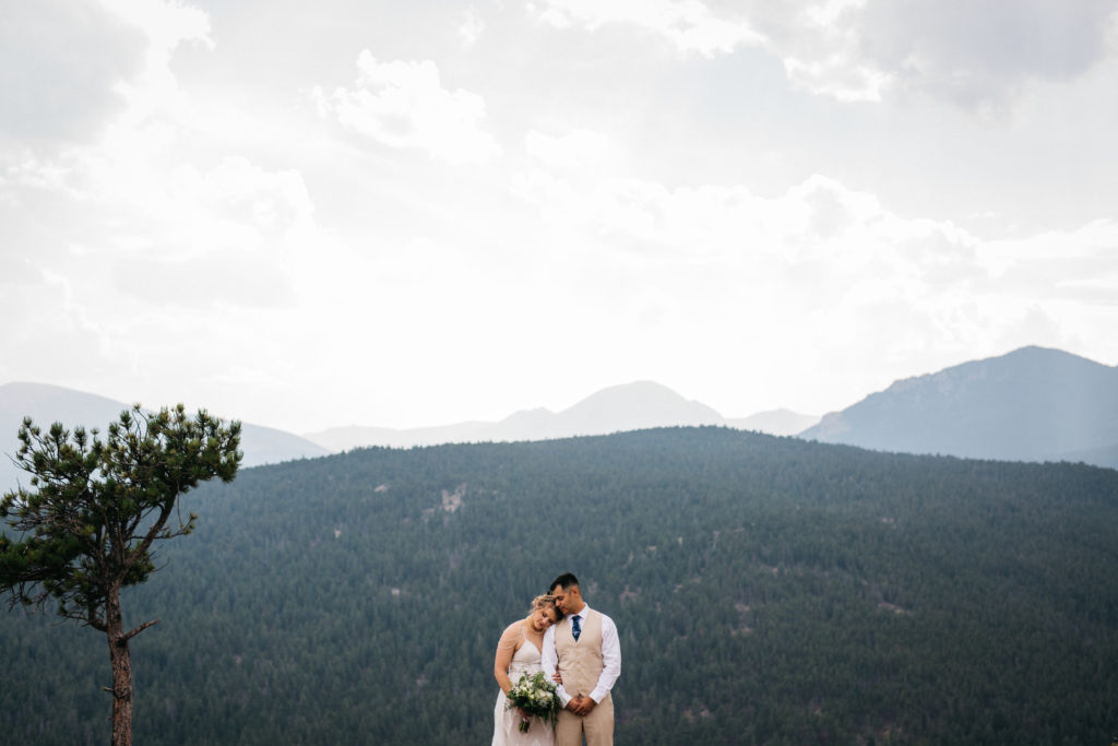 Photo of a bride and groom at their elopement in Rocky Mountain National Park