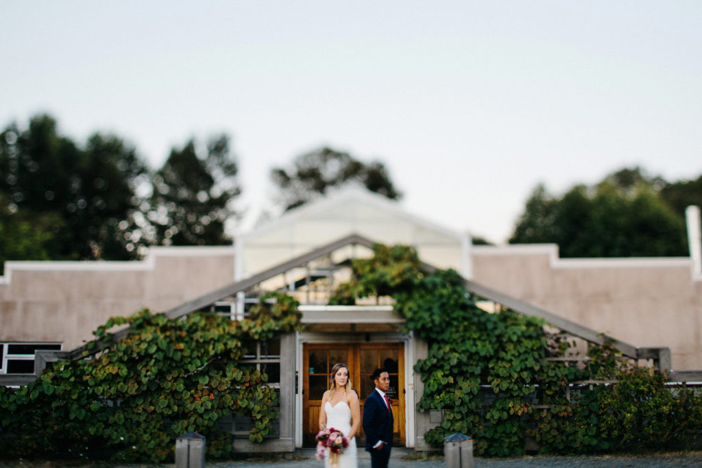 Portrait of a bride and groom during their wedding in Seattle at the University of Washington Center for Urban Horticulture