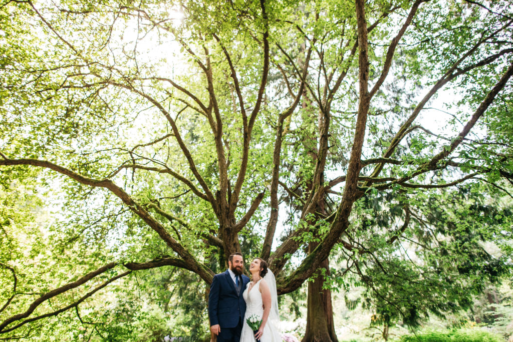 Wedding photo of a bride and groom at the University of Washington Botanic Gardens