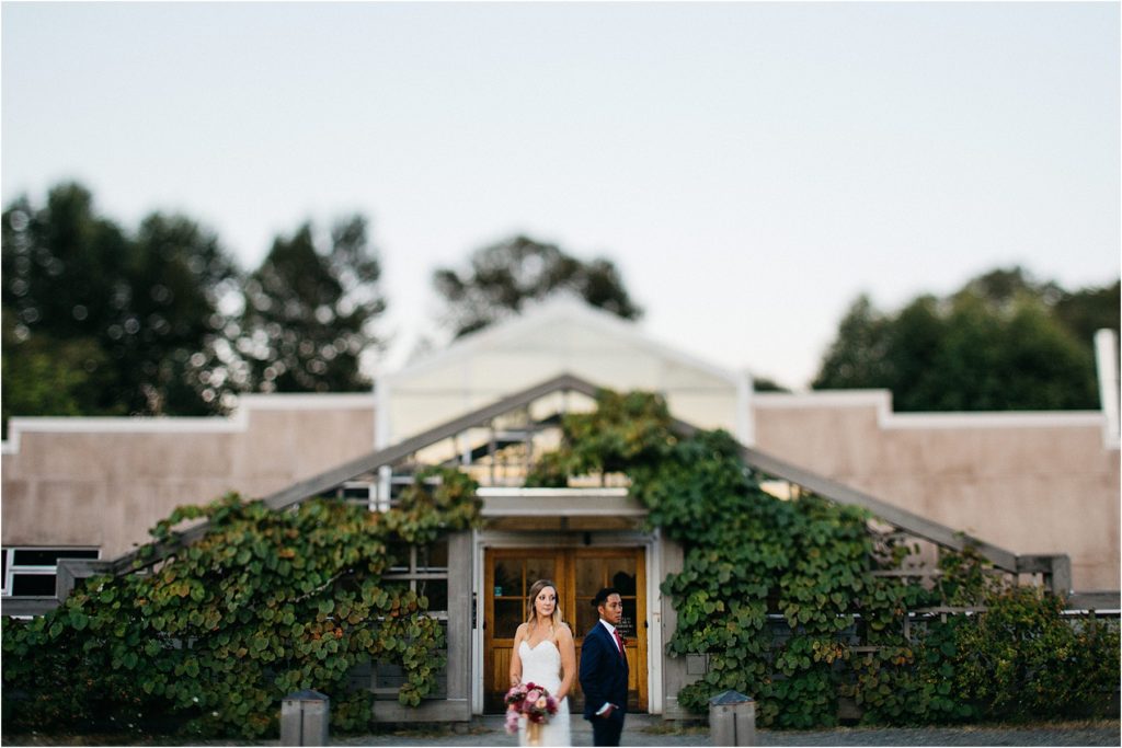 Wedding photo of a bride and groom in Seattle, Washington at the UW Center for Urban Horticulture