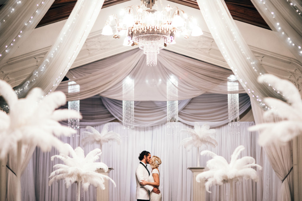 Portrait of a bride and groom during their wedding at Elysian Ballroom in Portland, Oregon