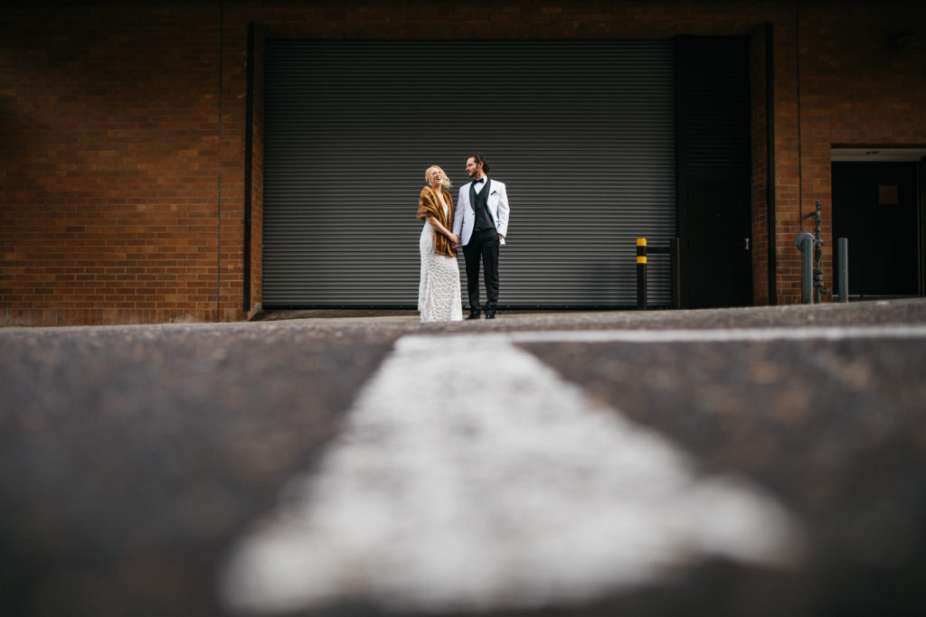 Photo of a bride and groom on their wedding day in downtown Portland