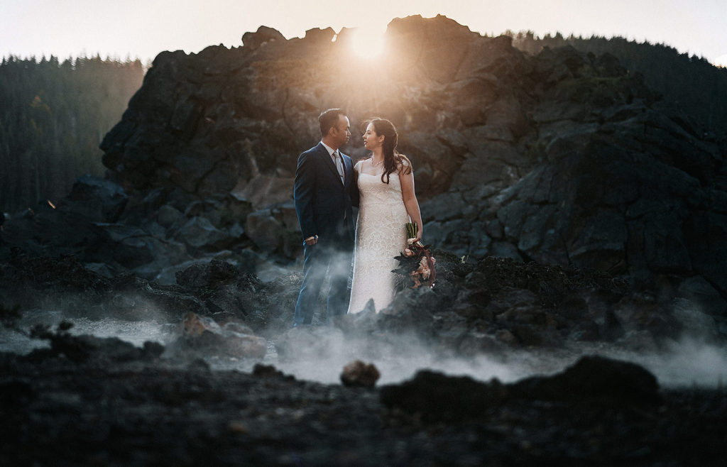 A bride and groom during their elopement at Sparks Lake in Bend, Oregon