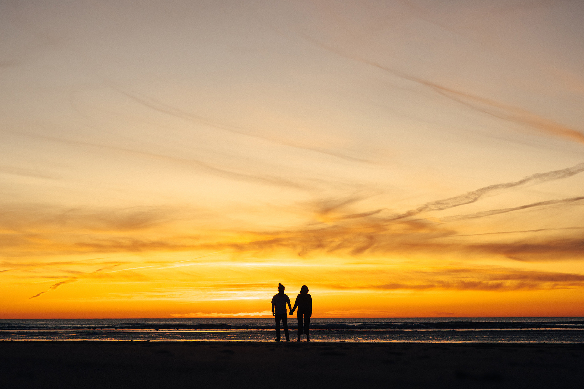 Sunset engagement photo at Cannon Beach, Oregon