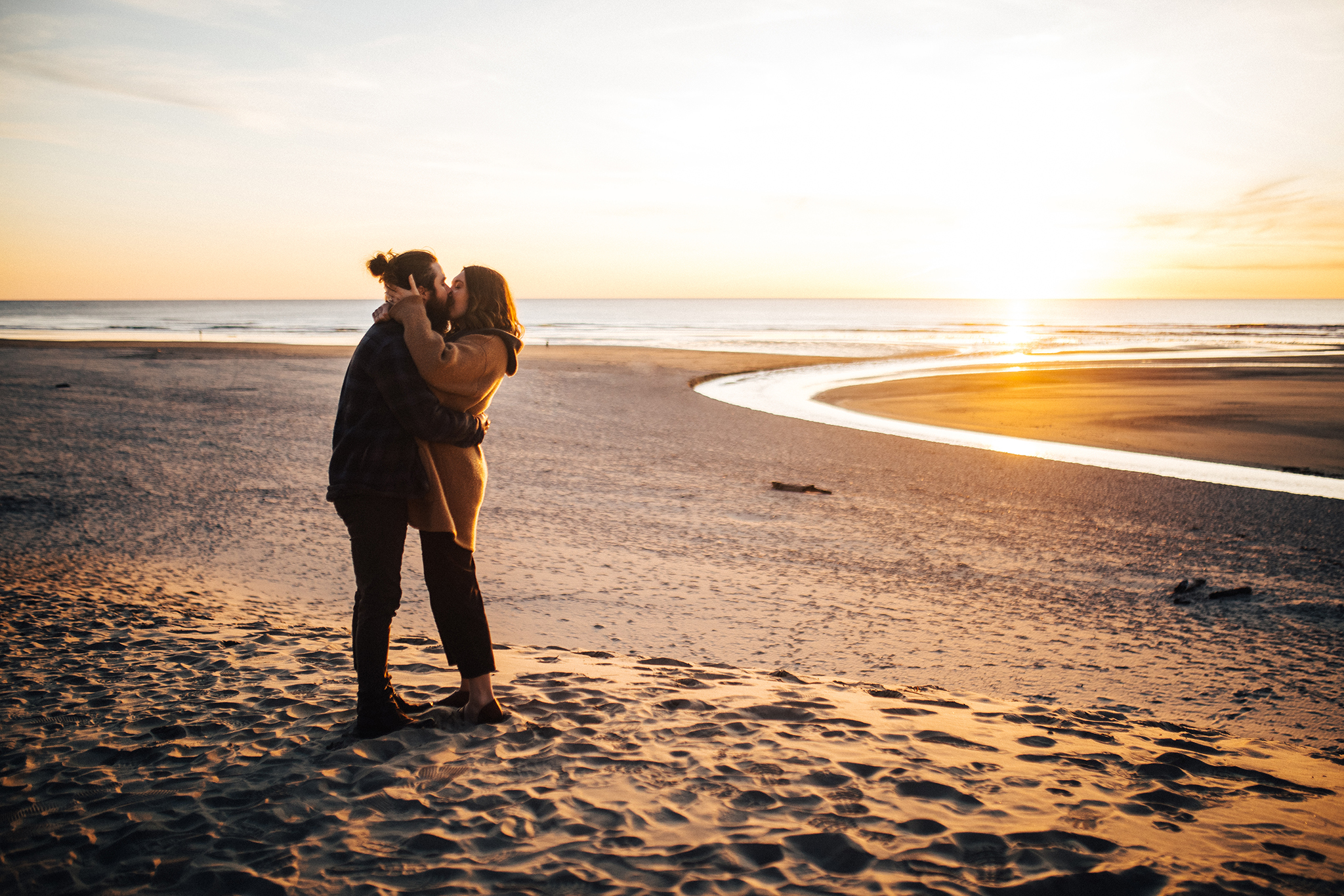Sunset engagement photo at Cannon Beach