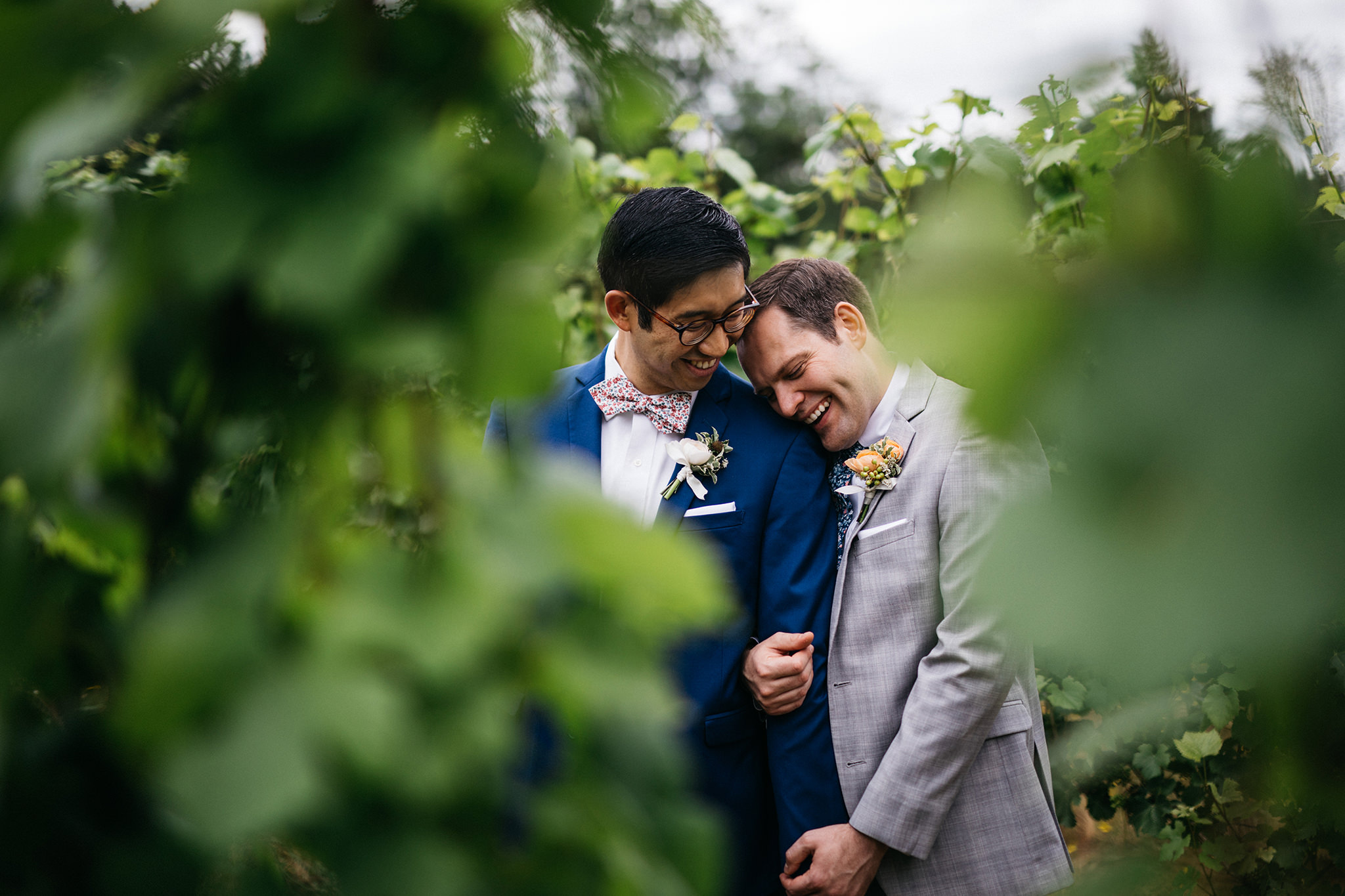 Same sex wedding photo in the vineyard at Red Ridge Farms