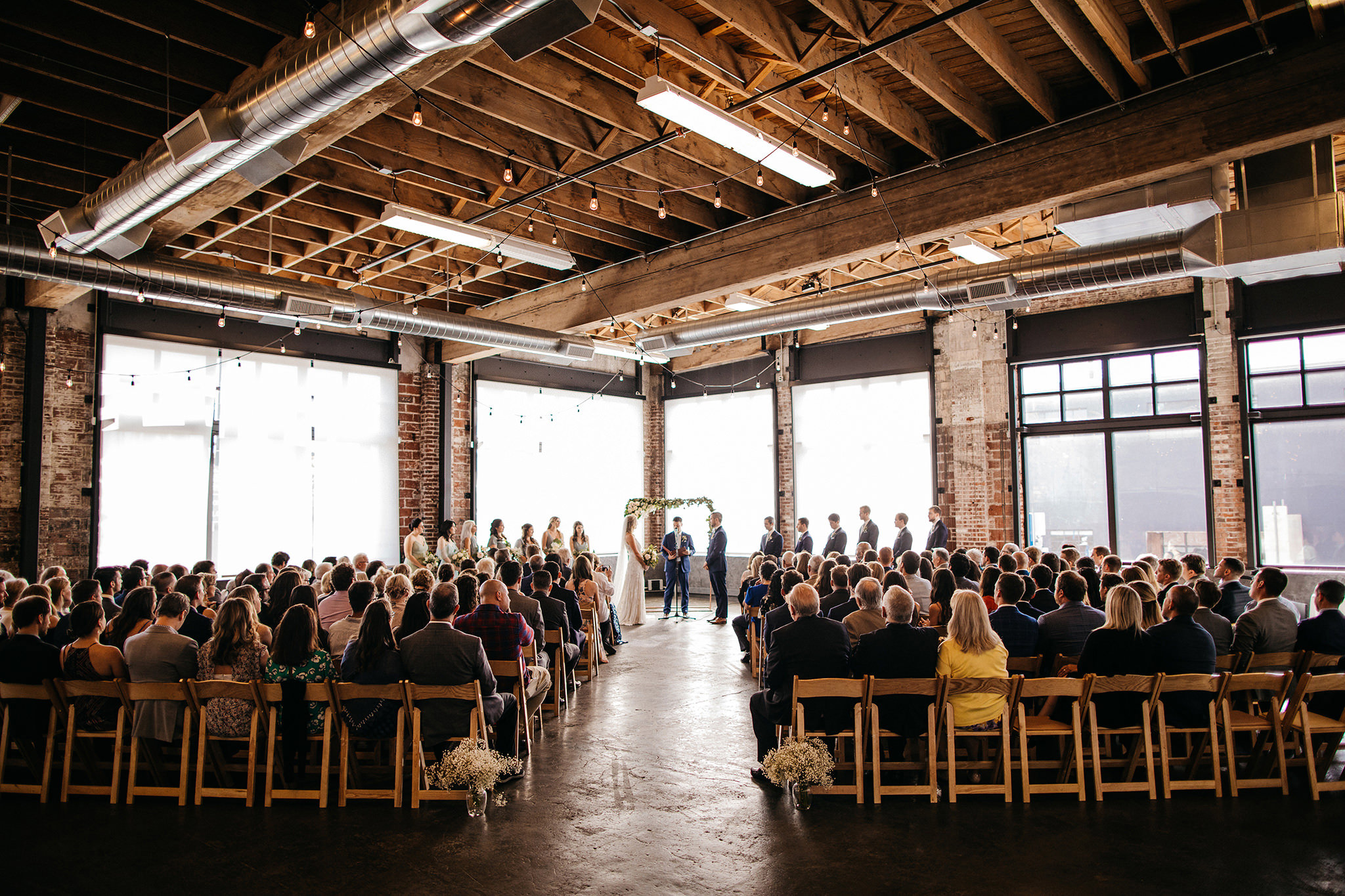 An industrial wedding ceremony at Leftbank Annex in Portland, OR