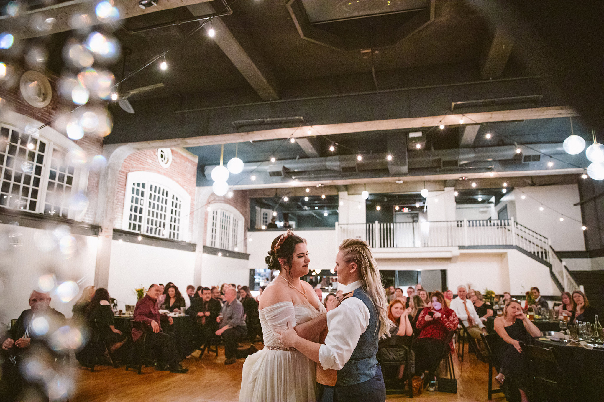 Two brides during their first dance at The Evergreen in Portland, Oregon