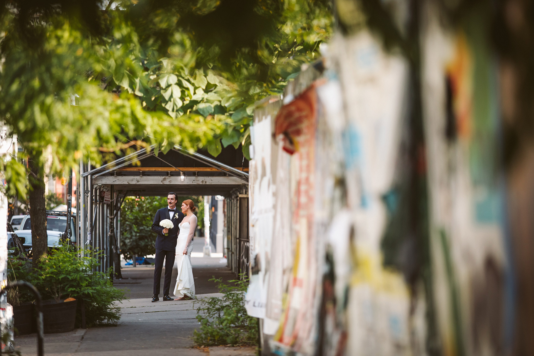 A bride and groom walking around Williamsburg in Brooklyn, New York