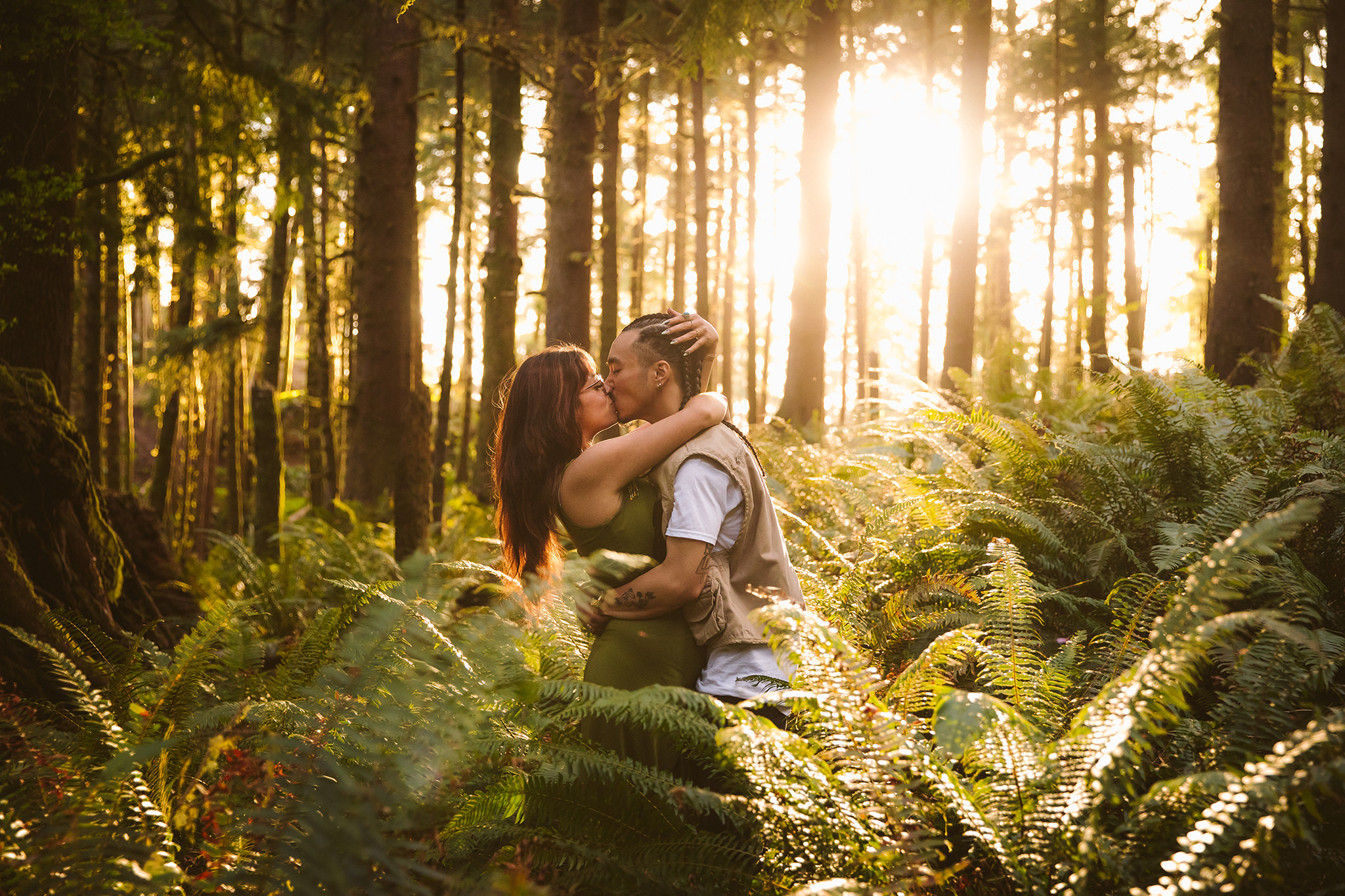A couple in the woods during their Cannon Beach surprise proposal