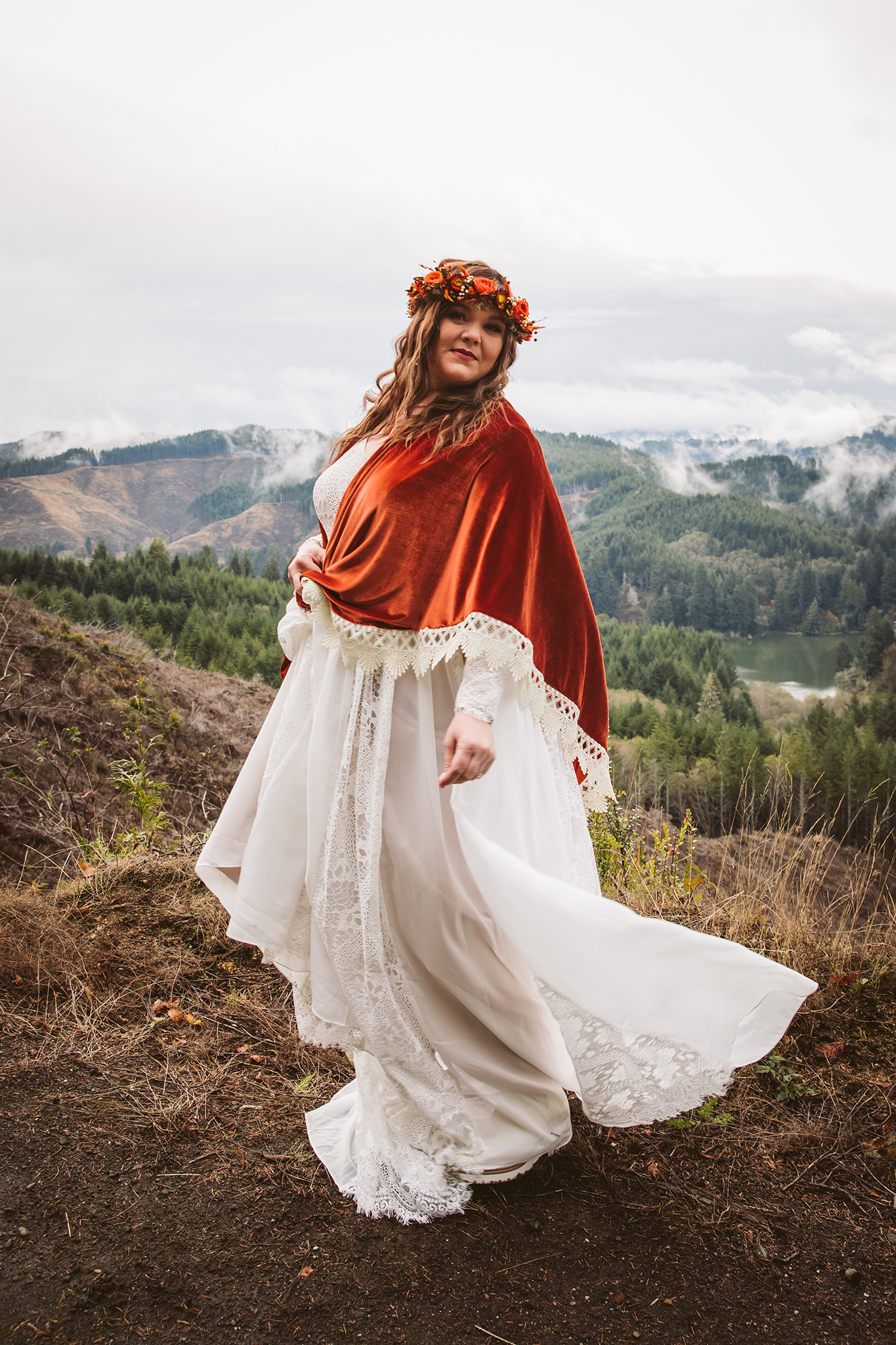 A bride wearing fall colors on a cloudy morning at her Coos Bay, Oregon wedding