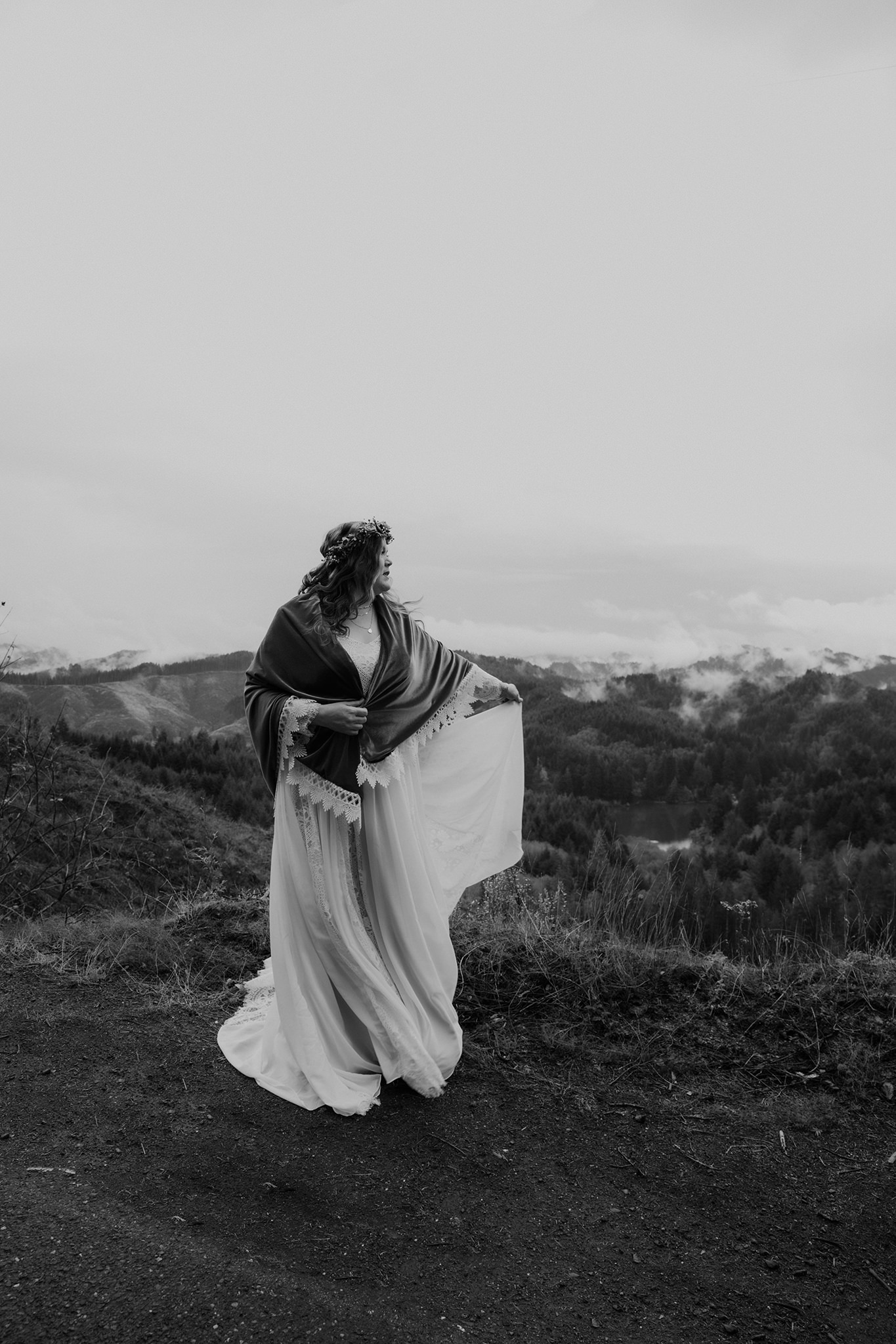 A moody black and white photo of a bride in southern Oregon