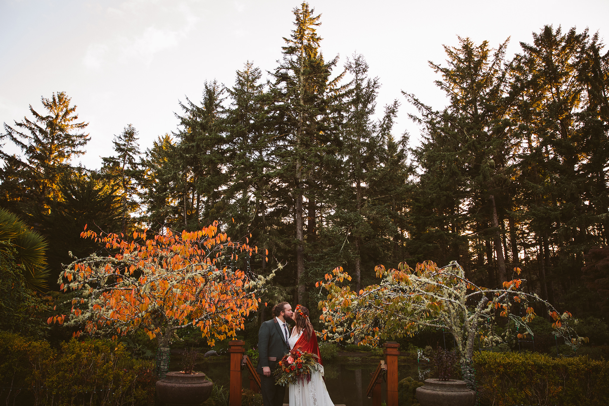 A wedding photo in the formal garden at Shore Acres State Park in Oregon