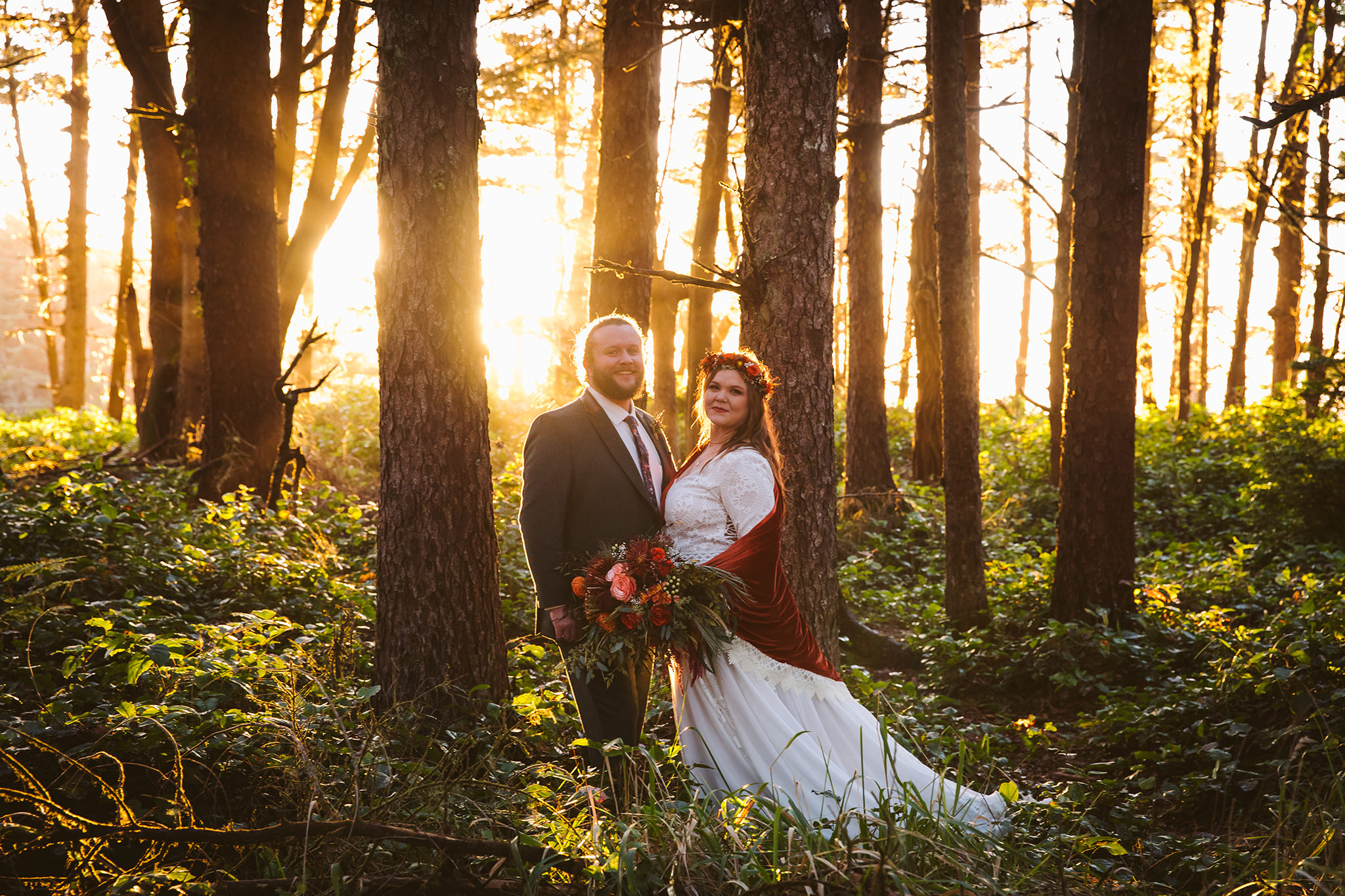 A wedding photo in the Oregon woods at golden hour