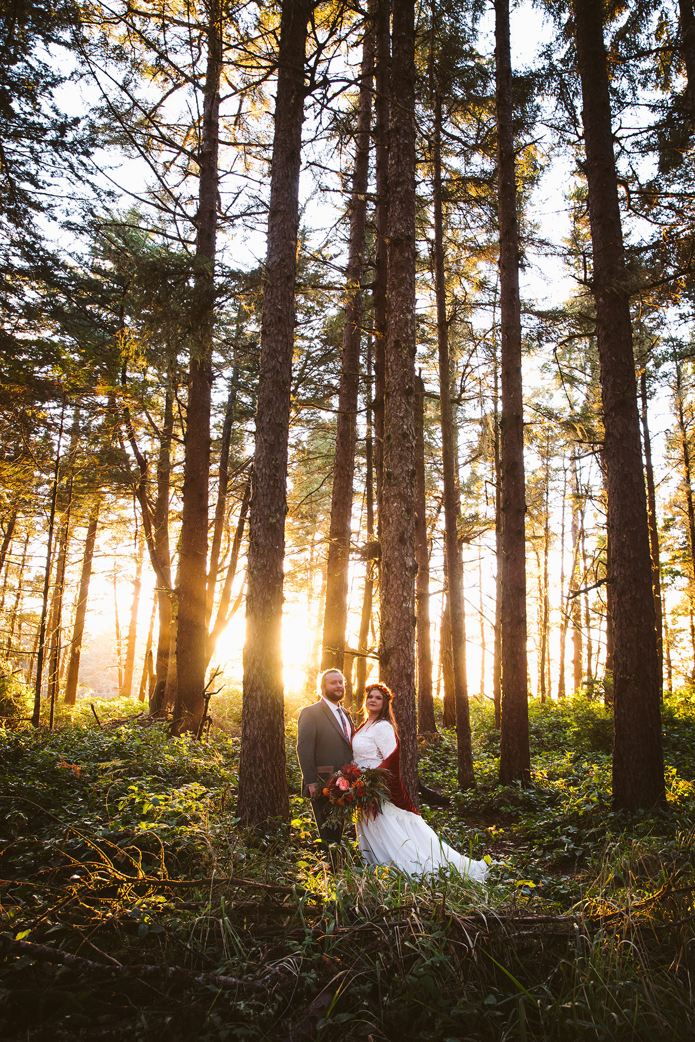 A couple during their woodsy Oregon elopement at golden hour 